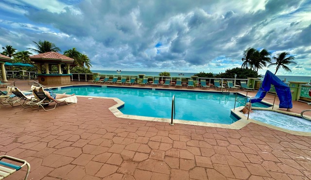 Oceanfront 2 Room Suite with Resort Amenities.