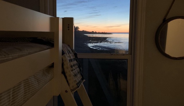 Oceanfront beach cottage panoramic views spectacular sunsets sandbars warm water