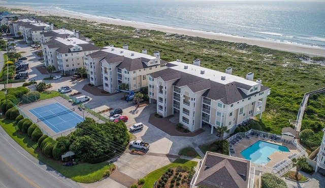 Oceanfront condo w/ocean views, 2 pools, beach access & tennis court.