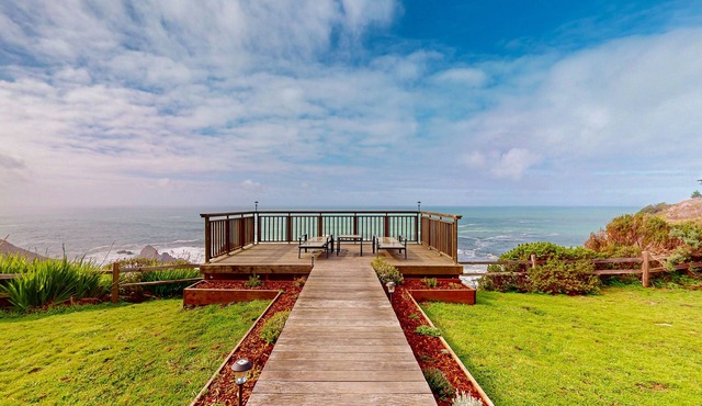 Oceanfront cottage with deck, stunning 180-degree views & 7.5 acres