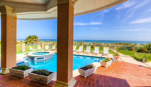Oceanfront duplex with pool spa putting green walkway to beach