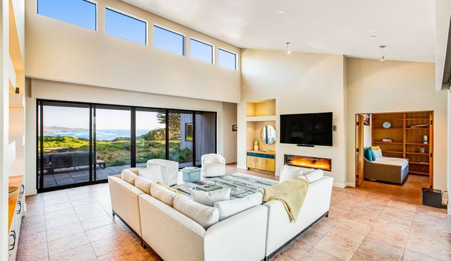 Oceanfront home with fireplace, EV charger & ocean views