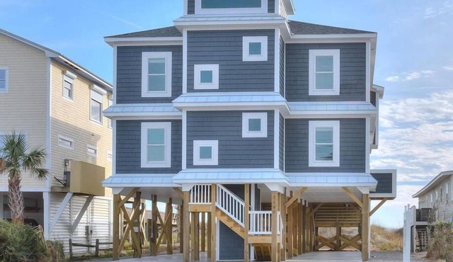 Oceanfront luxury retreat in Oak Island with 8 bedrooms, ideal for 22 guests.