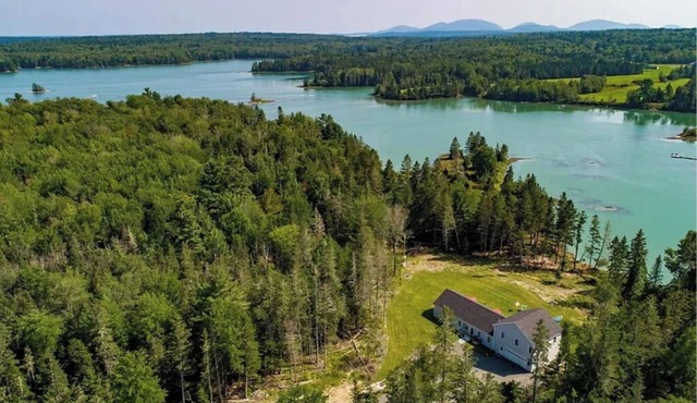 Oceanfront, modern + mobility-minded home with hot tub, fire pit and game room