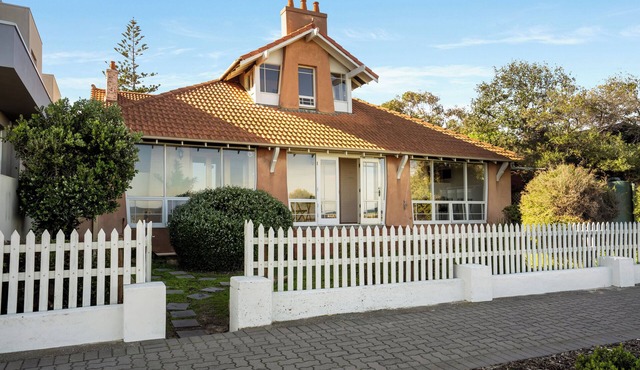 "Oceanfront Oasis: A Tranquil Retreat Steps from the Sea!