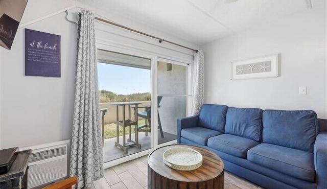 Oceanfront Patio Suite with daily housekeeping and welcoming front desk staff