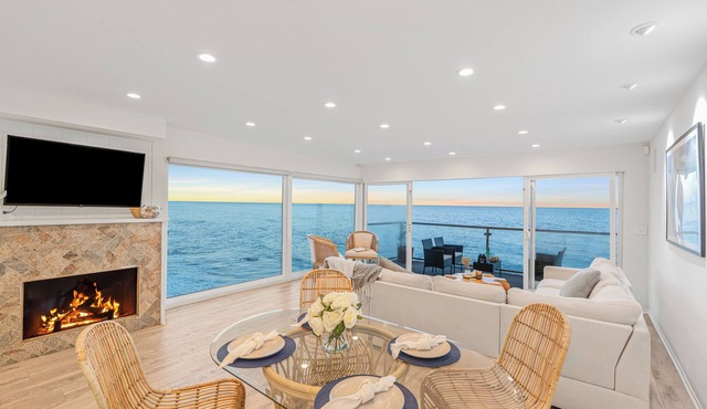 Oceanfront Retreat with Multiple Balconies, Direct Beach Access & Sweeping Views