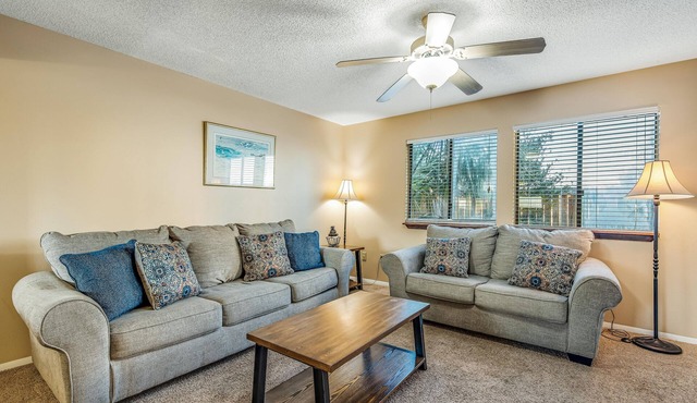 Oceanfront townhouse near beach with pool, balcony, central AC, & washer/dryer