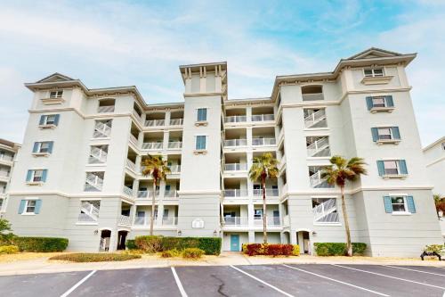 Oceanview condo with resort amenities, balcony and private beach access