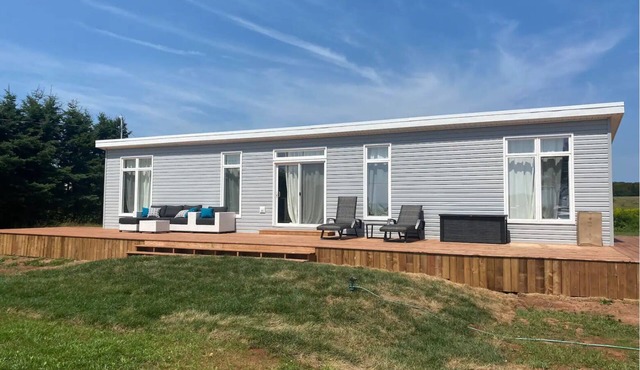 Oceanview haven- steps to the beach in this 2bedroom cottage with large deck