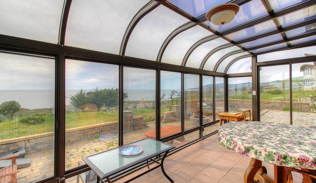 Oceanview home w/ incredible views, sunroom, courtyard - near beaches/trails