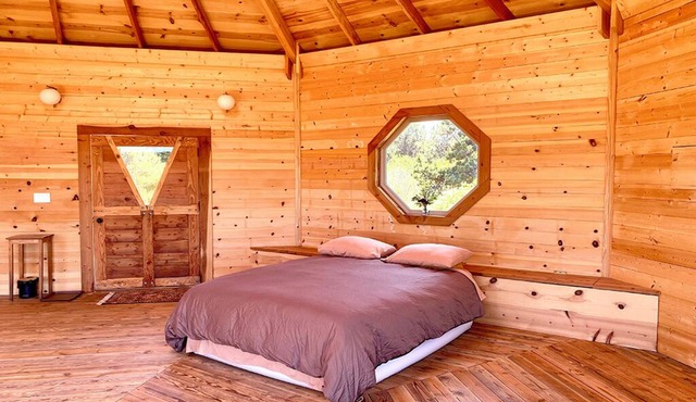 Octagon coastal cabin retreat. Private and pet friendly.