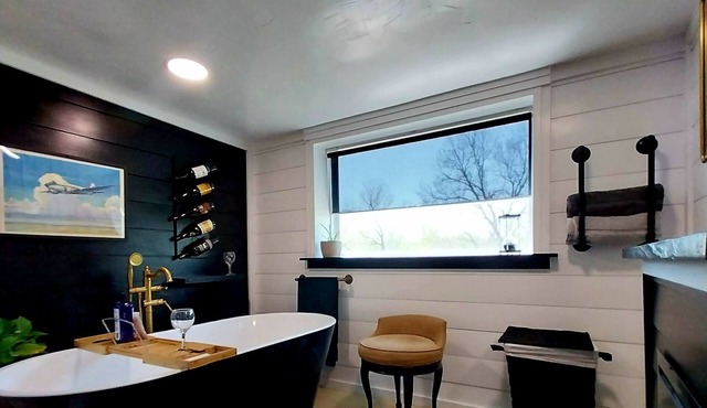 Off-grid Shipping Container Metal Home Hybrid Getaway on the river! Sleeps 8!