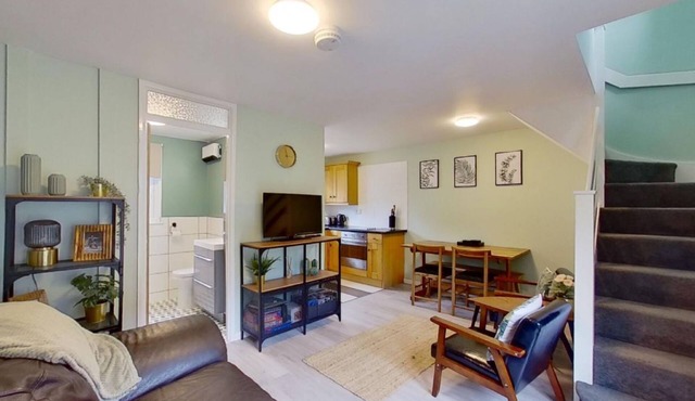 Offering comfortable living space for up to four guests within the leafy grounds of Tolroy Manor