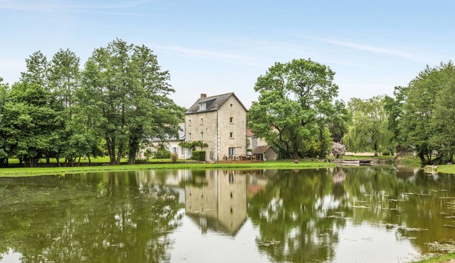 Old mill from the 19th century and its pond in the heart of the Châteaux of the Loire Valley