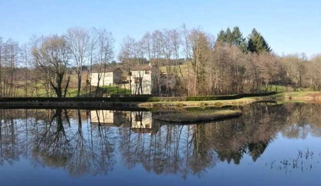 Old mill in a green setting