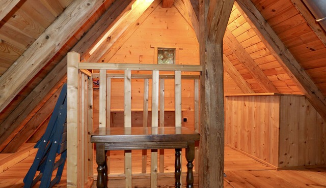 Old small renovate mountain cowshed, in rural environment