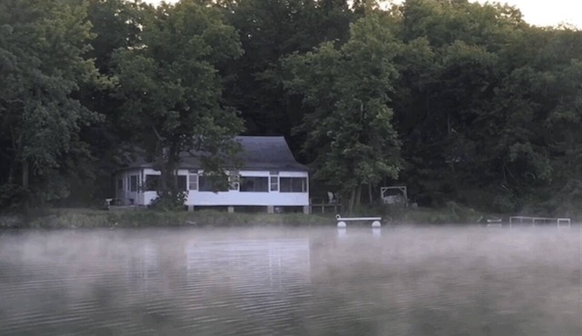 Old Style Summer Lake Cabin