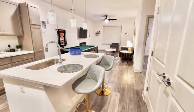 Oliver Capital | Cozy, Entertainment Suite