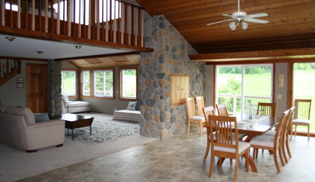 On 278 pristine acres, 1 acre fishpond, close to all Spring Green attractions!