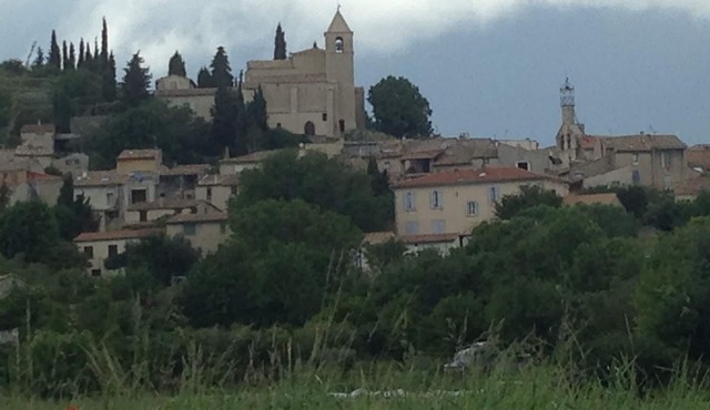 On a Luberon hillside, a bright, spacious village house with great views.