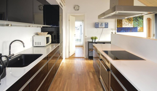 On a large natural plot in a newly parceled cottage area lies this luxury house.