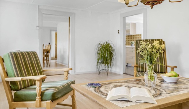 On a large plot with garden awaits you this cozy former homestead.