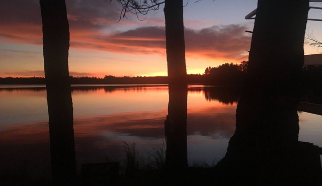 On snowmobile trail via lake or road. Eagle River Chain, on Catfish Lake.