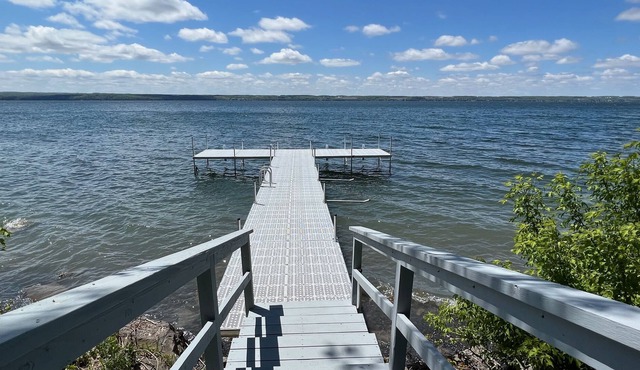 On the Lake, in the Village, Sunsets at your Door!