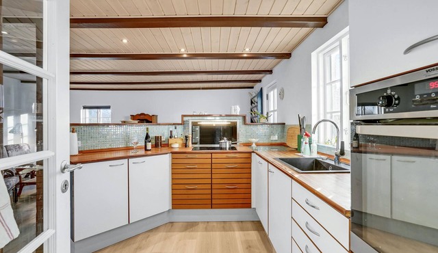 On the quiet island of Askø, this beautiful vacation home near the beach welcomes you.