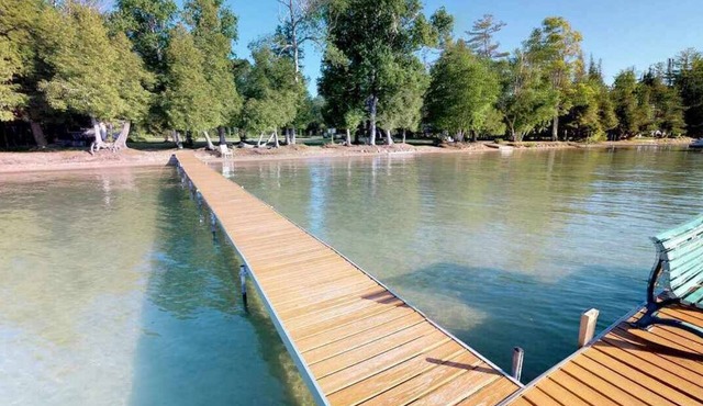 On Walloon Lake! Beautifully remodeled large condo with beach area.