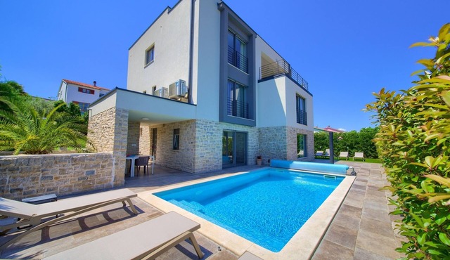 One bedroom apartment with air-conditioning Njivice, Krk (A-22805-a)