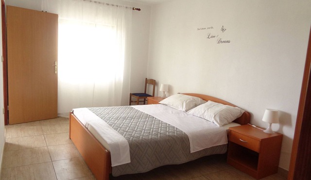 One bedroom apartment with terrace and sea view Lopar, Rab (A-17103-c)