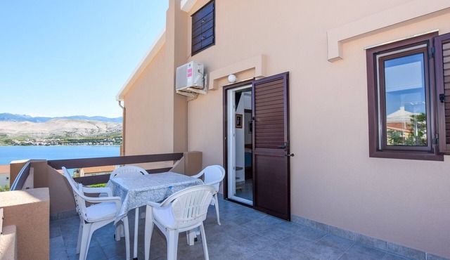One bedroom apartment with terrace and sea view Pag (A-6316-a)
