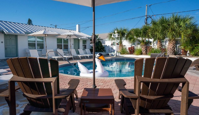 One bedroom poolside suite. Steps to beach and John’s Pass. HEATED POOL.