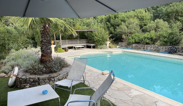 One Bedroomed Self Contained Guest Cottage with large private terrace and pool