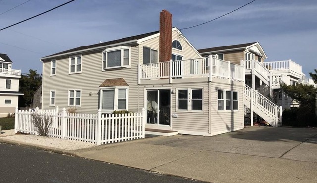 ONE HOUSE FROM THE BEACH!