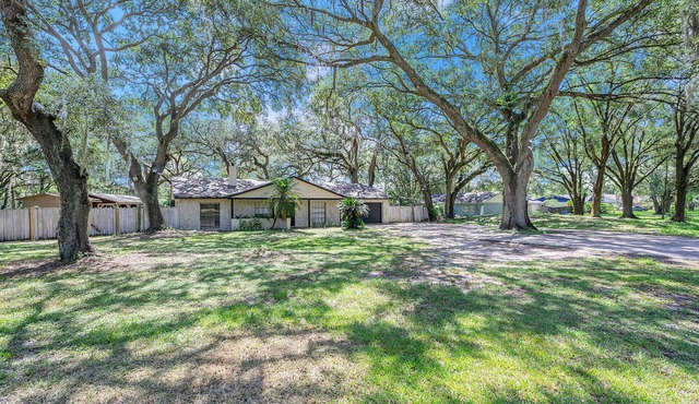 One level home on acreage with privacy