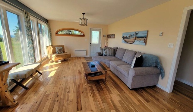 One-minute walk to a sandy beach. Beachside Haven Cottage awaits.
