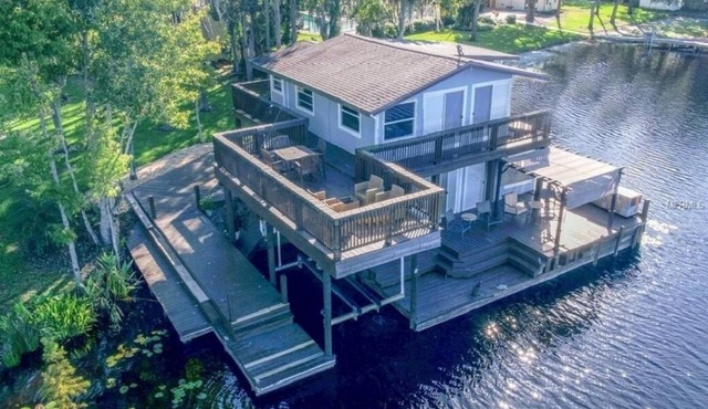 One of a Kind Fully Renovated Historic Boathouse with TRIZILLION dollar views!