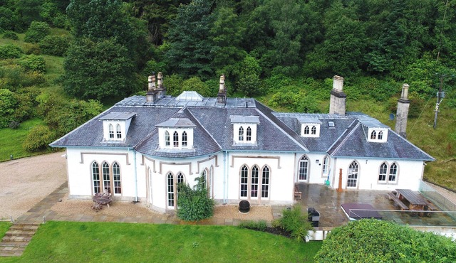 One of a kind home, with hot tub and views of Loch Lomond.