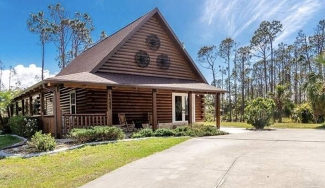 One of a kind, real log home in southwest Florida!