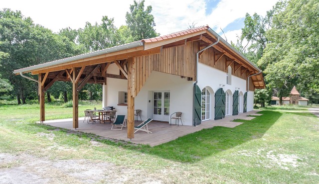 One-story house in a forest park on the shore of the lake, ocean 8 km away.