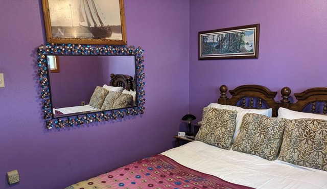 Only feet from the bay and private beach, Romantic Room with Queen bed.