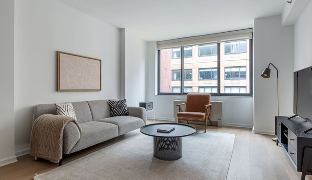 Open Chelsea 2BR w/Gym & W/D, nr Park, by Blueground