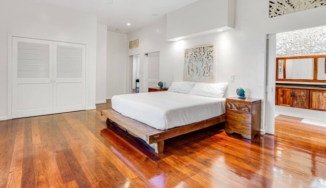 Open concept villa with a tropical garden setting, lanai & patios