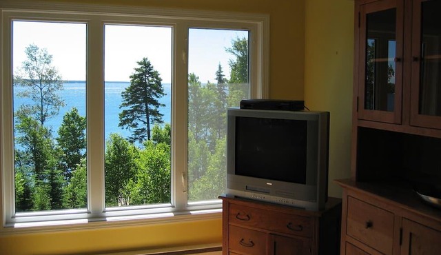 Open Concept Waterfront Home On Private Sandy Beach