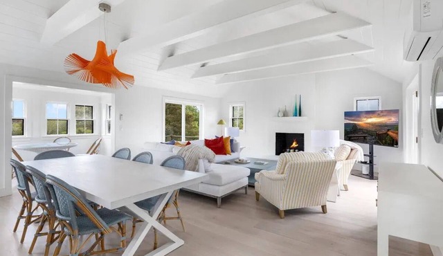 Open floor plan home with multiple decks