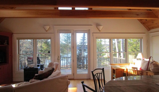 Open Plan Shorefront Home With Dock And Sunsets