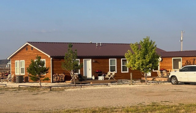 Open skies & breathtaking scenery from this 2-bdrm cabin deck.